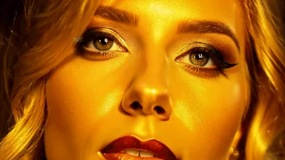 Close Up Portrait Of A Woman With Golden Makeup