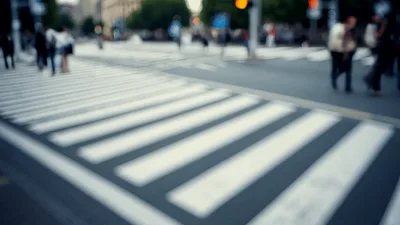 Blurred Pedestrians Crossing Busy City Street Intersection