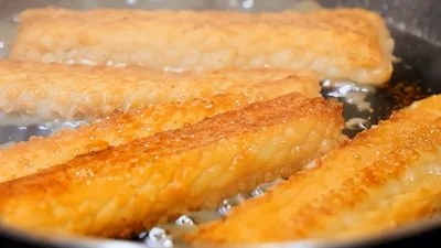 Tempeh Strips Frying In A Hot Skillet
