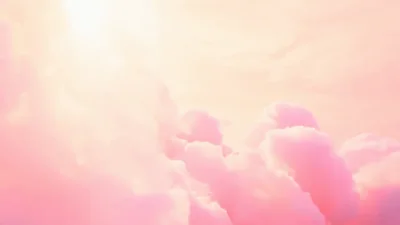 Soft Pink Clouds Floating In A Dreamy Sky