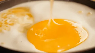 Cooking A Sunny Side Up Egg In A Pan