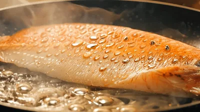 Fresh Fish Fillet Searing In A Hot Pan