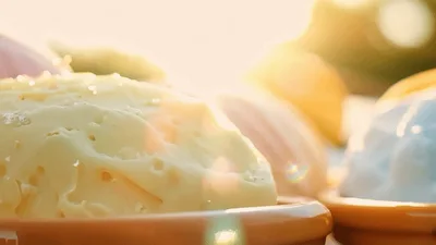 Colorful Scoops Of Ice Cream In Sunlight