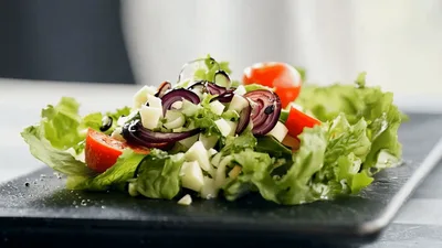 Fresh Vegetable Salad Plated on Black Slate
