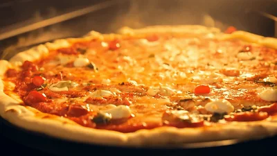 Pizza Baking Inside A Hot Oven