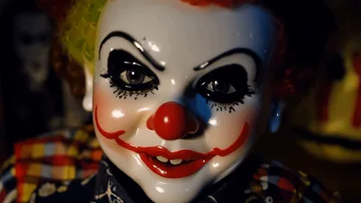 Creepy Clown Doll Staring Directly Into Camera