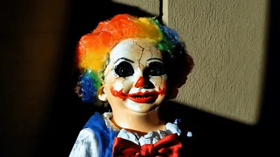 Creepy Cracked Clown Doll With Rainbow Hair