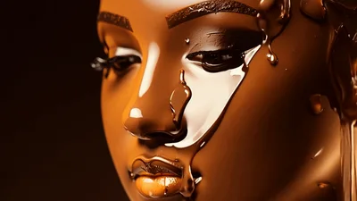 Liquid Chocolate Pouring Over A Sculpted Female Face
