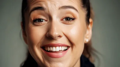 Young Woman Smiling At The Camera