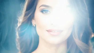 Beautiful Woman Smiling With Lens Flare Effect