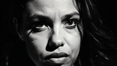 Close Up Portrait Of A Woman In Black And White