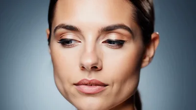 Beautiful Woman Looking At Camera With Natural Makeup