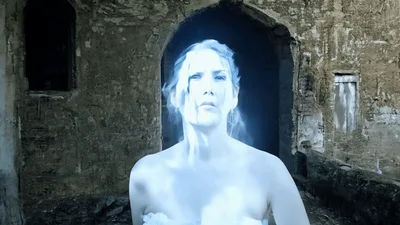 Ghostly Woman In White Dress Appearing In Ruined Castle