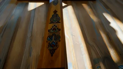 Wooden Cross Illuminated By Sunlight In Church