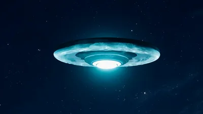 Glowing Alien Spaceship Hovering In Deep Space