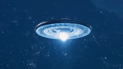 UFO Flying Saucer Hovering Over Mountain Landscape