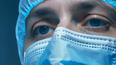 Close Up Of Surgeon Eyes During Medical Procedure