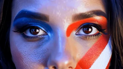 Close Up Of Woman With Patriotic Face Paint