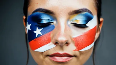Woman With American Flag Face Paint Opening Eyes