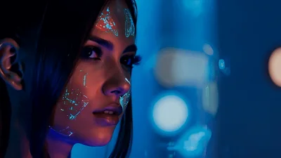 Futuristic Woman With Glowing Cybernetic Facial Patterns