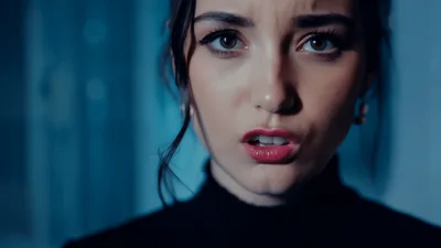Close Up Of A Young Woman Looking Intensely