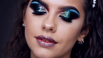 Close Up Portrait Of Woman With Artistic Glitter Makeup
