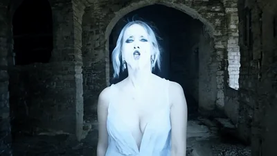 Ghostly Woman In White Dress Performing In Ruined Building