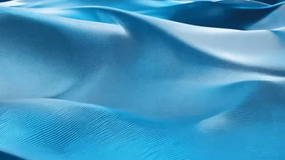 Abstract Blue Silk Fabric Waving In Slow Motion