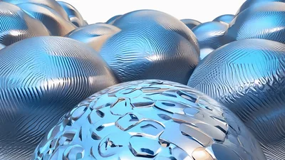 Abstract Metallic Spheres With Morphing Geometric Surface Patterns