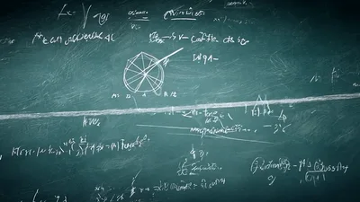 Mathematical Equations Written on a Green Chalkboard