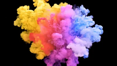 Colorful Ink Clouds Expanding In Water