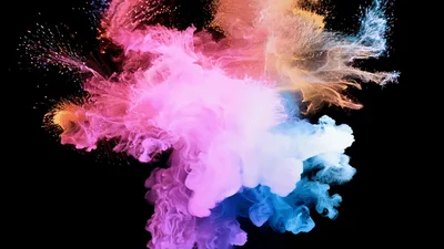 Colorful Ink Explosion Expanding In Black Background