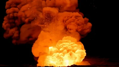 Massive Fiery Explosion With Thick Orange Smoke Clouds