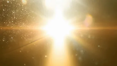 Bright Golden Light Burst Expanding Into Blue Flare