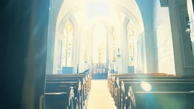 Heavy Wooden Church Doors Opening To Reveal Bright Sanctuary