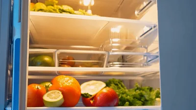 Opening A Refrigerator Door To Reveal Fresh Produce