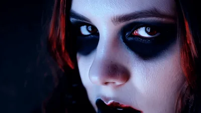 Gothic Woman With Dark Makeup Staring Intensely