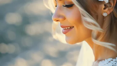 Beautiful Blonde Bride Smiling Outdoors In Wedding Dress