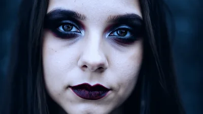 Young Woman With Gothic Makeup Looking At Camera