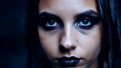 Gothic Woman With Dark Makeup Closing Her Eyes