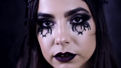 Gothic Woman With Dramatic Makeup Closing Her Eyes