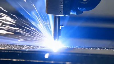 Industrial Plasma Cutter Slicing Through Thick Metal Plate