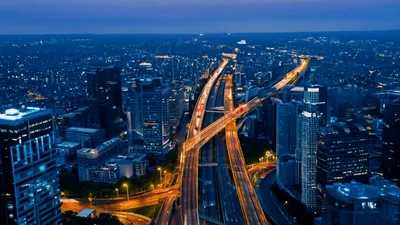 Aerial View of Busy Highway Interchange at Night