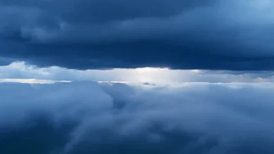 Aerial View Of Storm Clouds With Lightning Strike