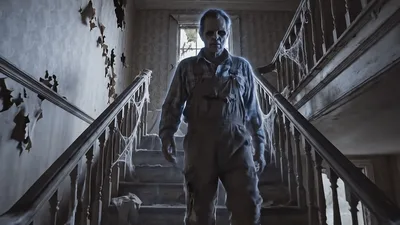 Ghostly Man Walking Down Stairs In Abandoned House
