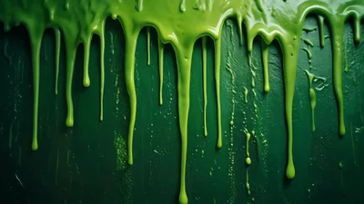 Bright Green Paint Dripping Down A Dark Green Surface