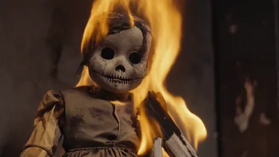 Creepy Doll Burning in Intense Fire Flames