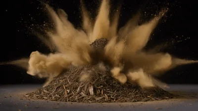 Explosive Burst Of Fine Brown Powder From Herb Pile