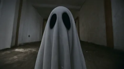Ghost Costume Standing In Abandoned Hallway