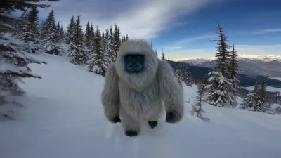 White Yeti Walking Through Snowy Mountain Landscape